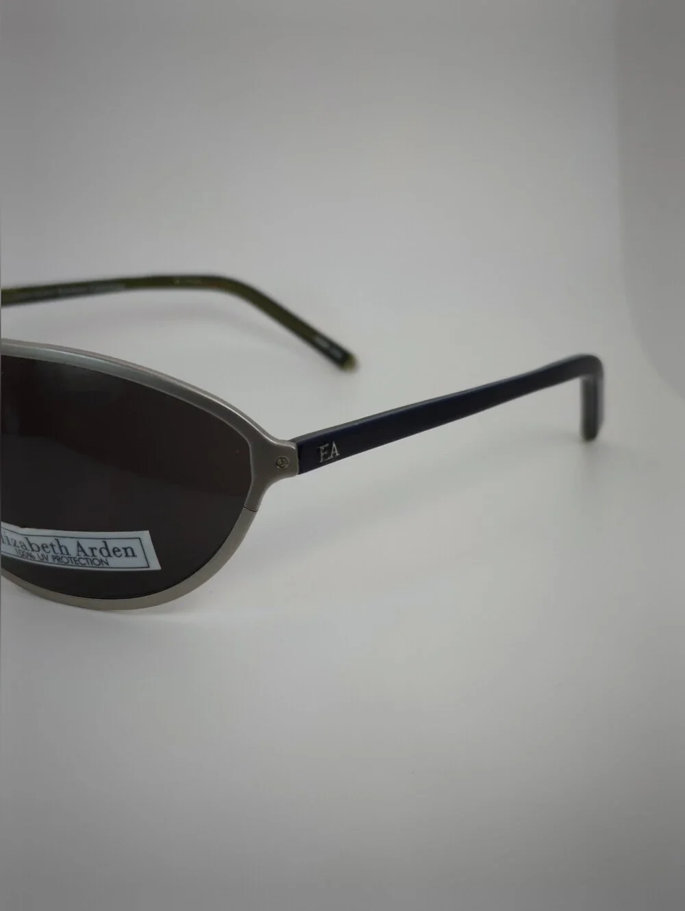Elizabeth Arden Oval Wrap Sunglasses with Dark Lenses and Silver Frame
